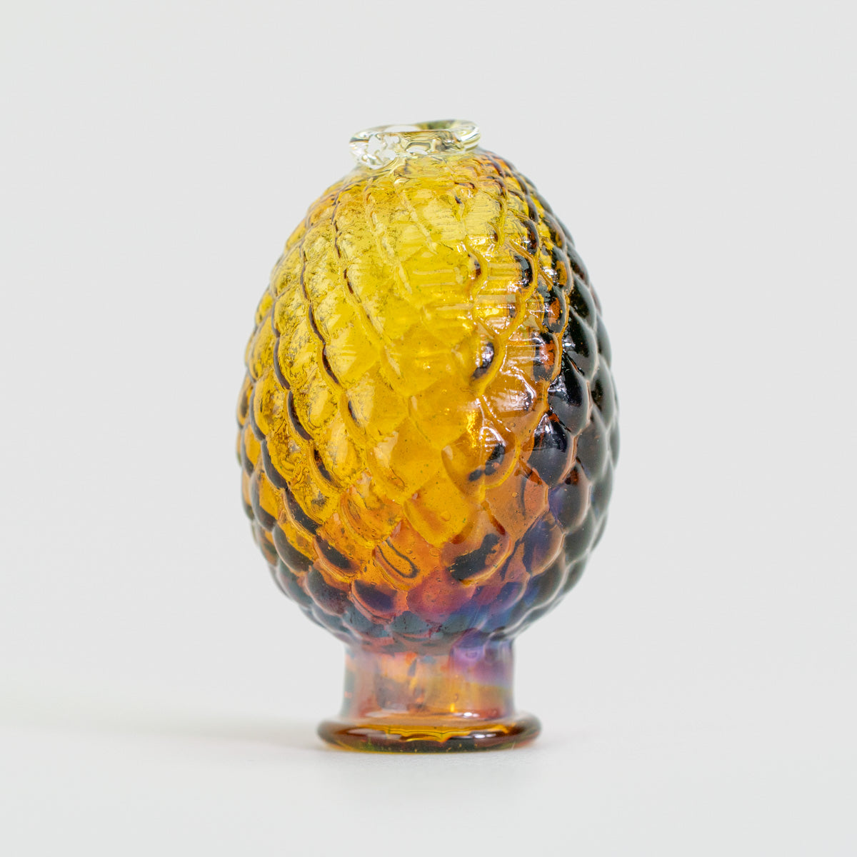 Amber dragon egg Pivot top with raised glass details
