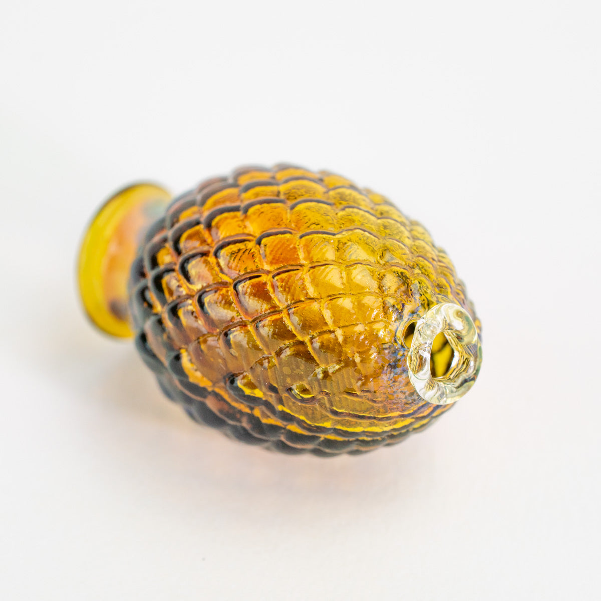 Amber glass Pivot accessory with fantasy dragon egg styling