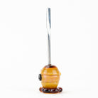 Amber honey dabber for concentrates with raised glass honeycomb detail