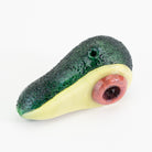 An avocado dry pipe with hole pit on white background