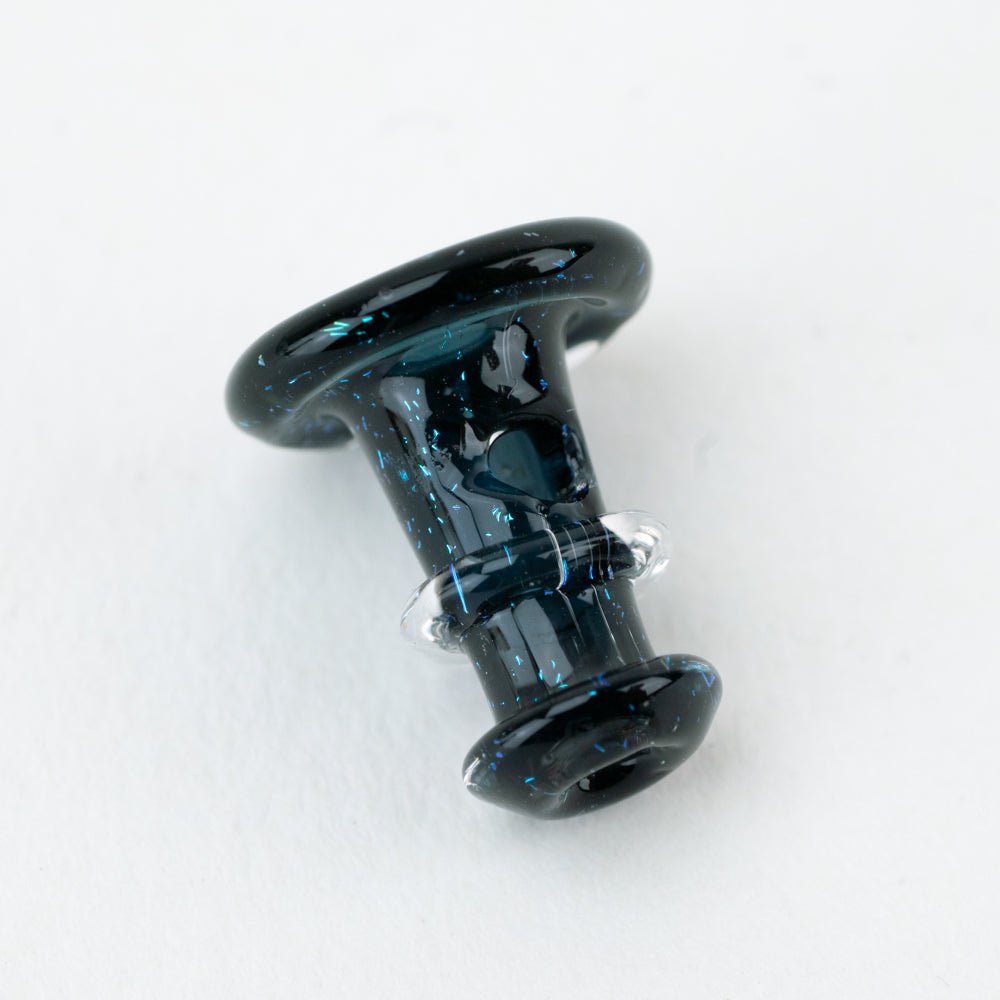 Black and blue Puffco joystick cap with subtle dichro finish