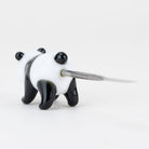 Black and white panda dabber with slim metal tip for concentrate handling