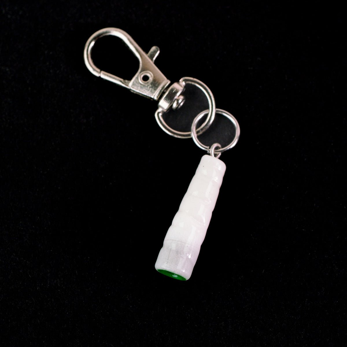 Blunt-inspired glass Puffco charm made for a fun collectible setup on black background