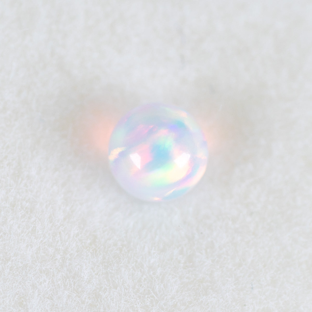 Closeup of the Celeste Opal 3mm terp pearl with a soft iridescent look