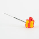 Yellow present dabber with red bow by Empire Smokes