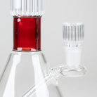 Close-up of the Ruby Signature Beaker showing its translucent red neck section, matching ribbed bowl, and glass joint