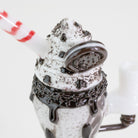 A closeup of a glass sundae mini rig on white background