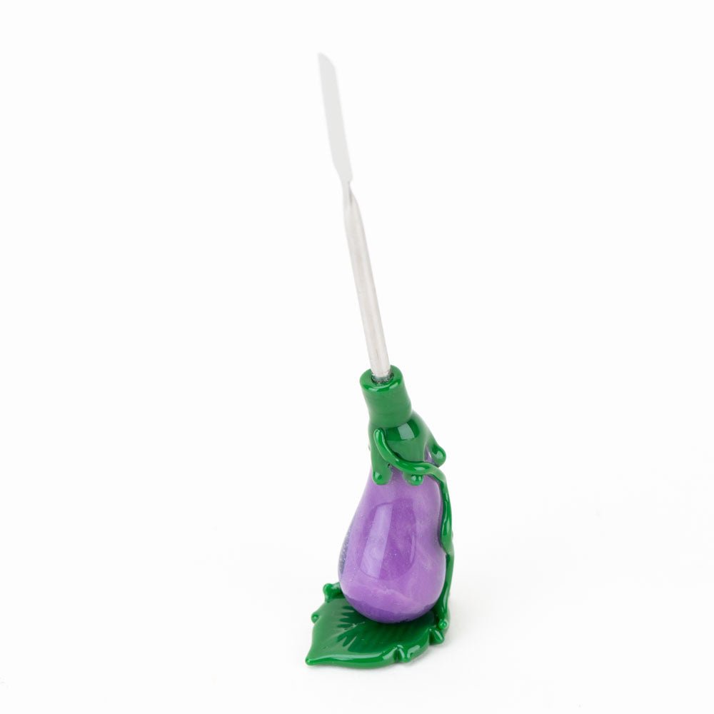 Collectible eggplant dab accessory by Empire Glassworks with purple glass artwork