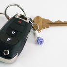 Collectible purple bong glass charm for bags, cases, and personal setup mounted on keys