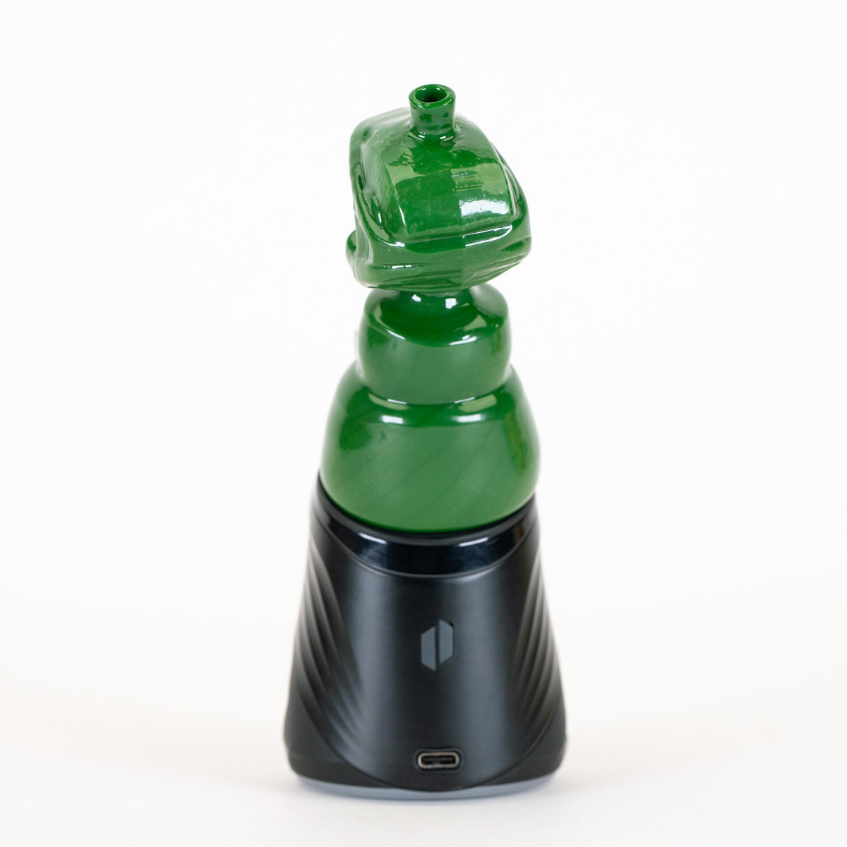 Collectible Spartan helmet Puffco attachment with bold green glass body
