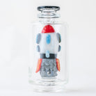 Angled view of a cosmic Puffco glass attachment by Empire Glassworks