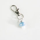 Cute blue mushroom glass charm styled as a Puffco accessory