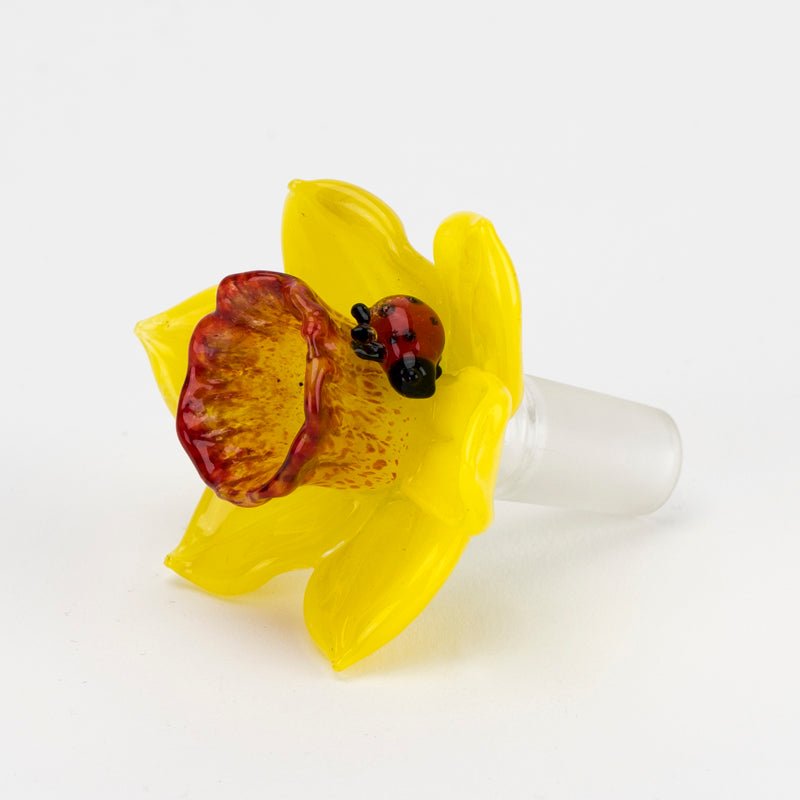 Close-up of the small red ladybug accent on the Daffodil Bowl Piece