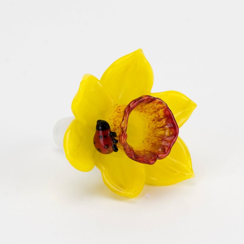 Front view of a yellow daffodil glass bowl with sculpted flower petals