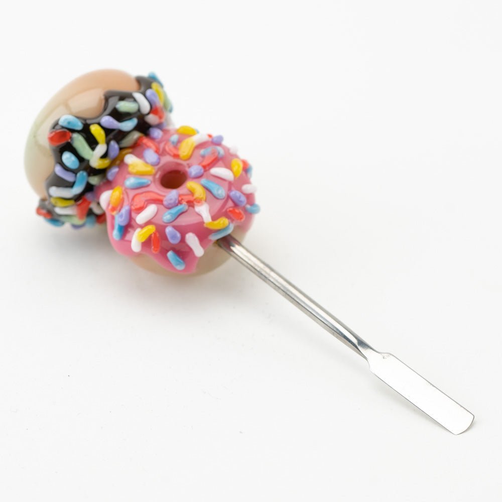 Donuts glass dabber tool with pink frosting, chocolate icing, and colorful sprinkle accents