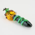 A small spoon pipe with decorative dragon  design