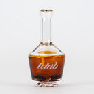 Drink Me glass Pivot accessory with potion bottle styling and amber color
