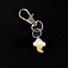 Cute lightning glass charm styled as a Puffco accessory