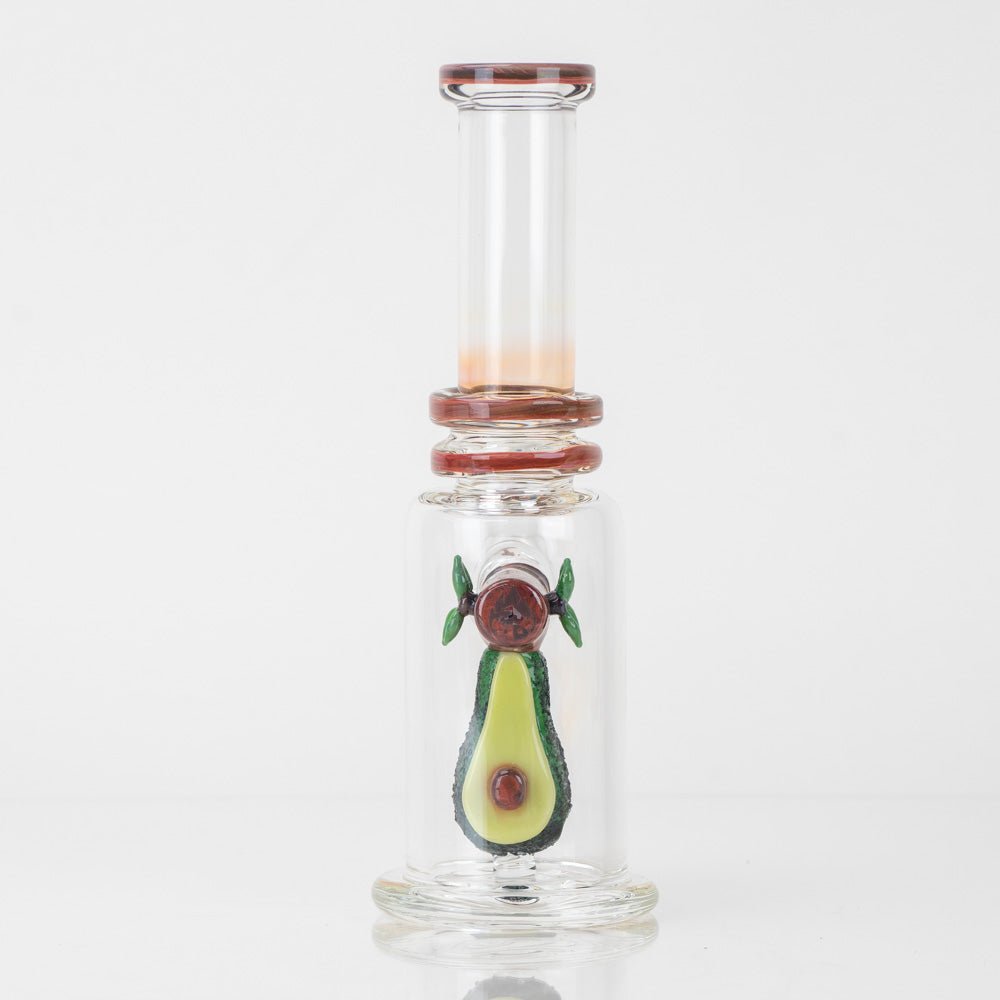 Empire Glassworks dab rig featuring detailed avocado glasswork inside the chamber