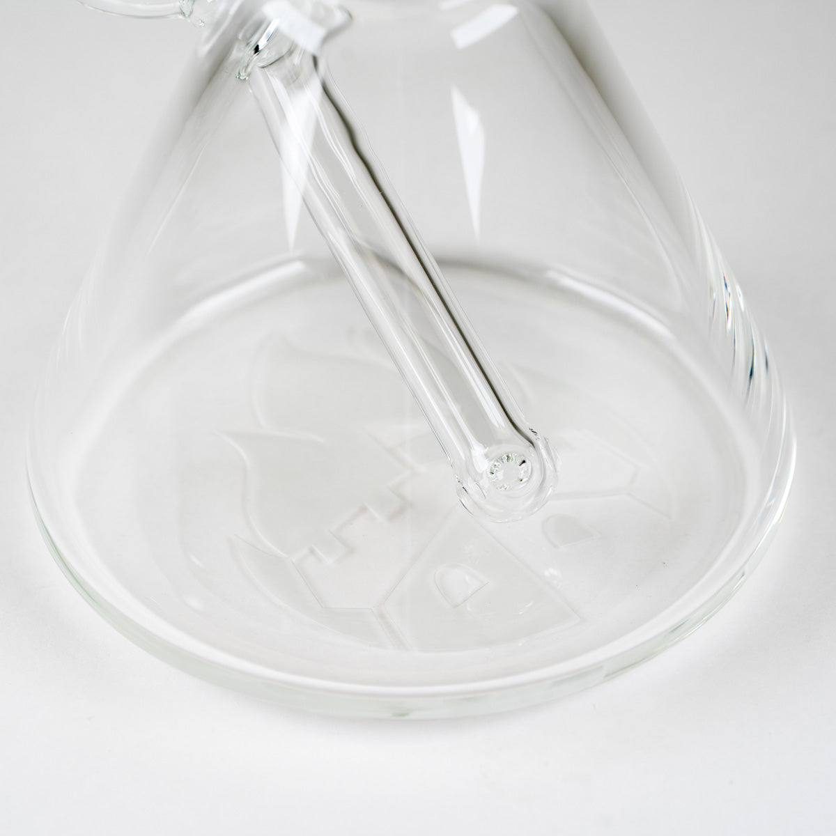 Interior view of the permanently integrated glass downstem inside the Crystal Signature Beaker Bong