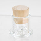 Empire Glassworks UV terp pearls in reusable glass container carb cap stand