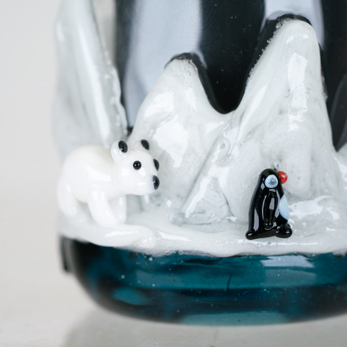Empire Glassworks arctic attachment featuring miniature wildlife and snowy glass details