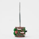 Empire Glassworks insect themed dab tool with sculpted glass base and slim metal tip