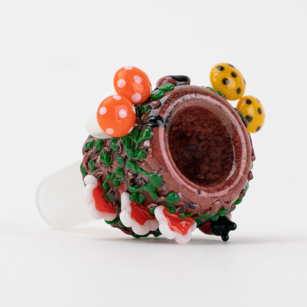 Close-up of the mushroom and vine details on the Empire Glassworks bowl