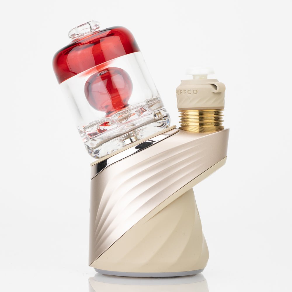 Empire Glassworks Puffco dry top featuring clear glass and ruby red accents