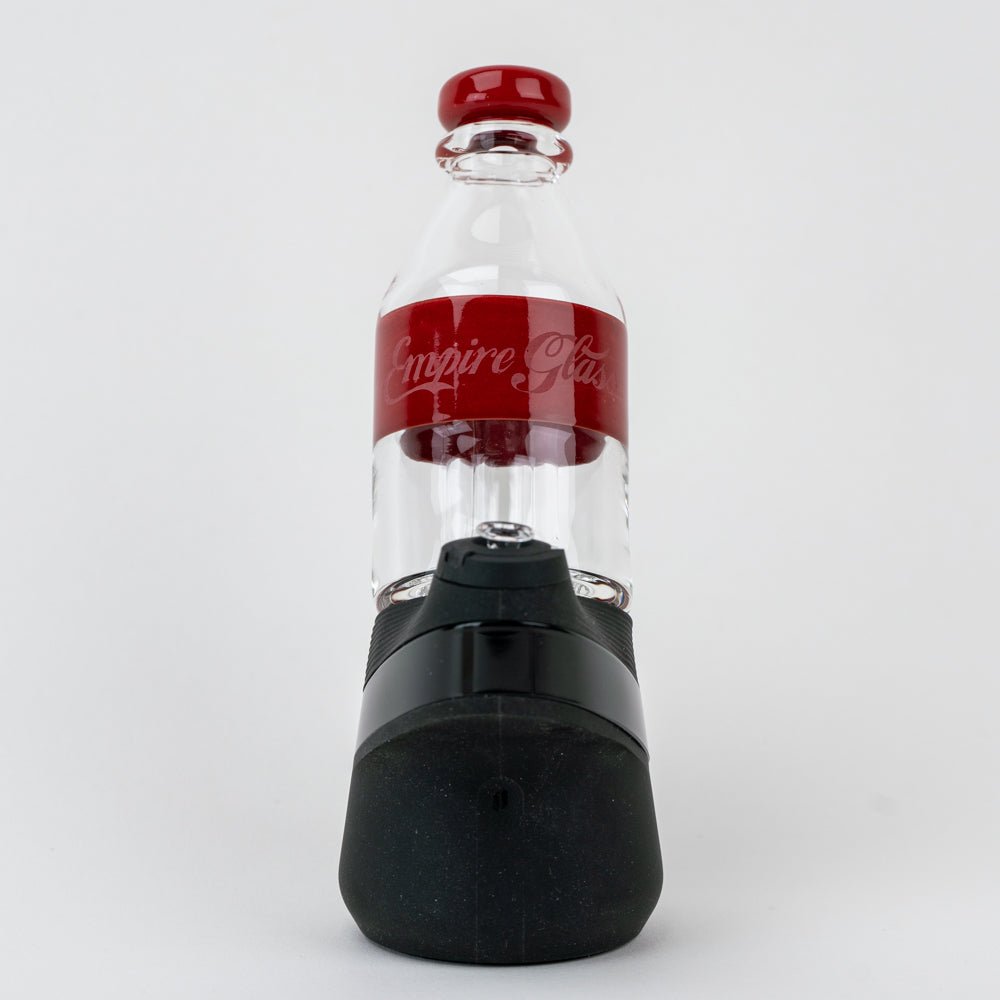 Empire Glassworks cola Puffco top shown on a black Puffco Peak device