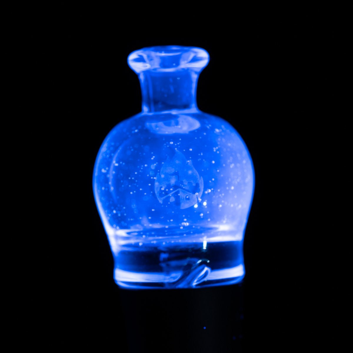 Empire Glassworks UV blue Puffco Pivot glass mouthpiece glowing under UV light