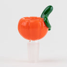 Pumpkin-shaped bong bowl piecet with a green stem on a white background