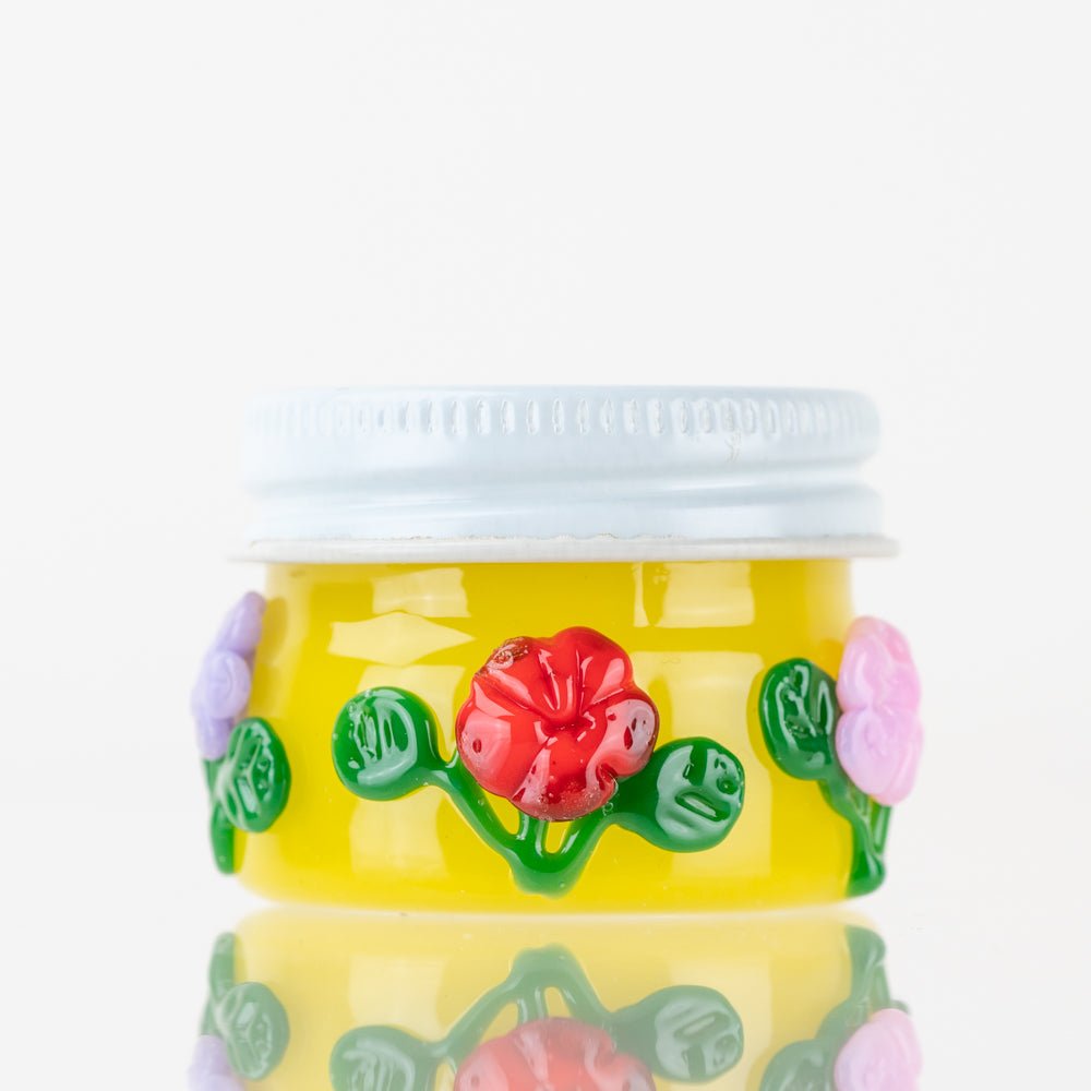 Empire Glassworks Sunshine Garden Terp Jar with yellow glass and raised flower details