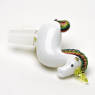 Side view of the unicorn glass bowl showing its white body and curled rainbow tail