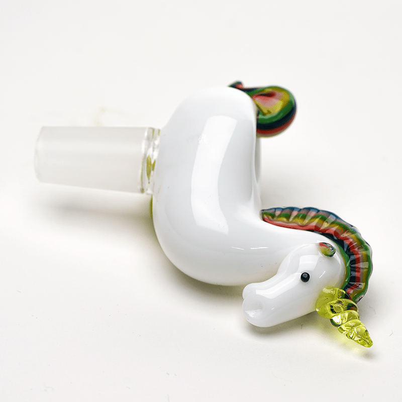 Side view of the unicorn glass bowl showing its white body and curled rainbow tail