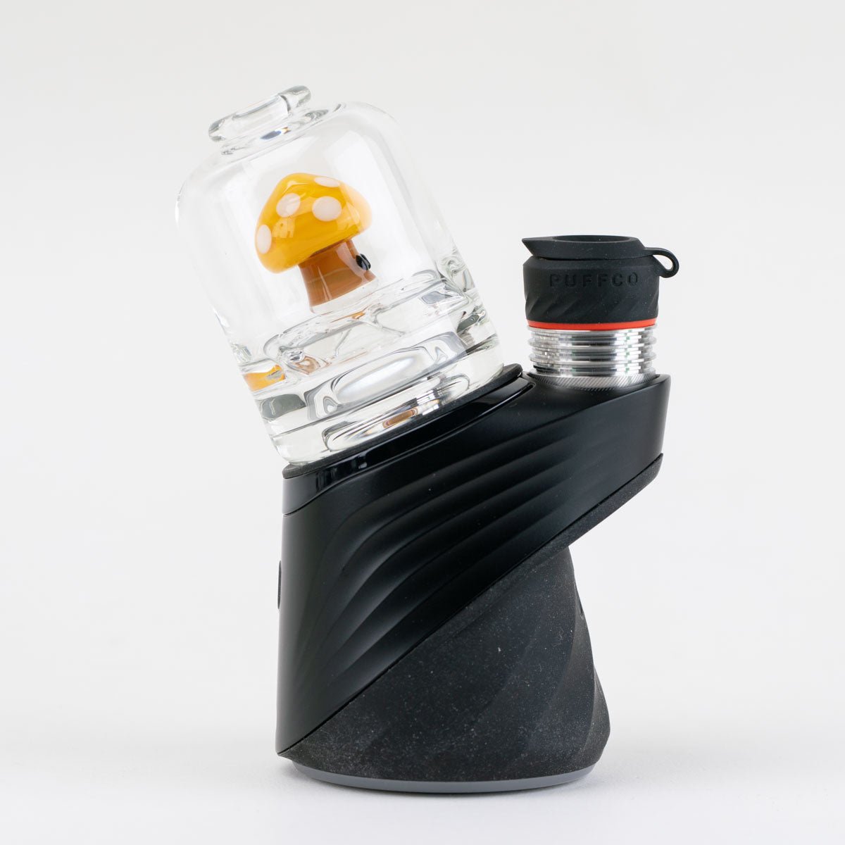 Empire Glassworks Yellow Mushroom dry top istalled on a black Puffco Peak Pro device