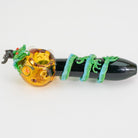 A glass small spoon pipe sideways with dragon design