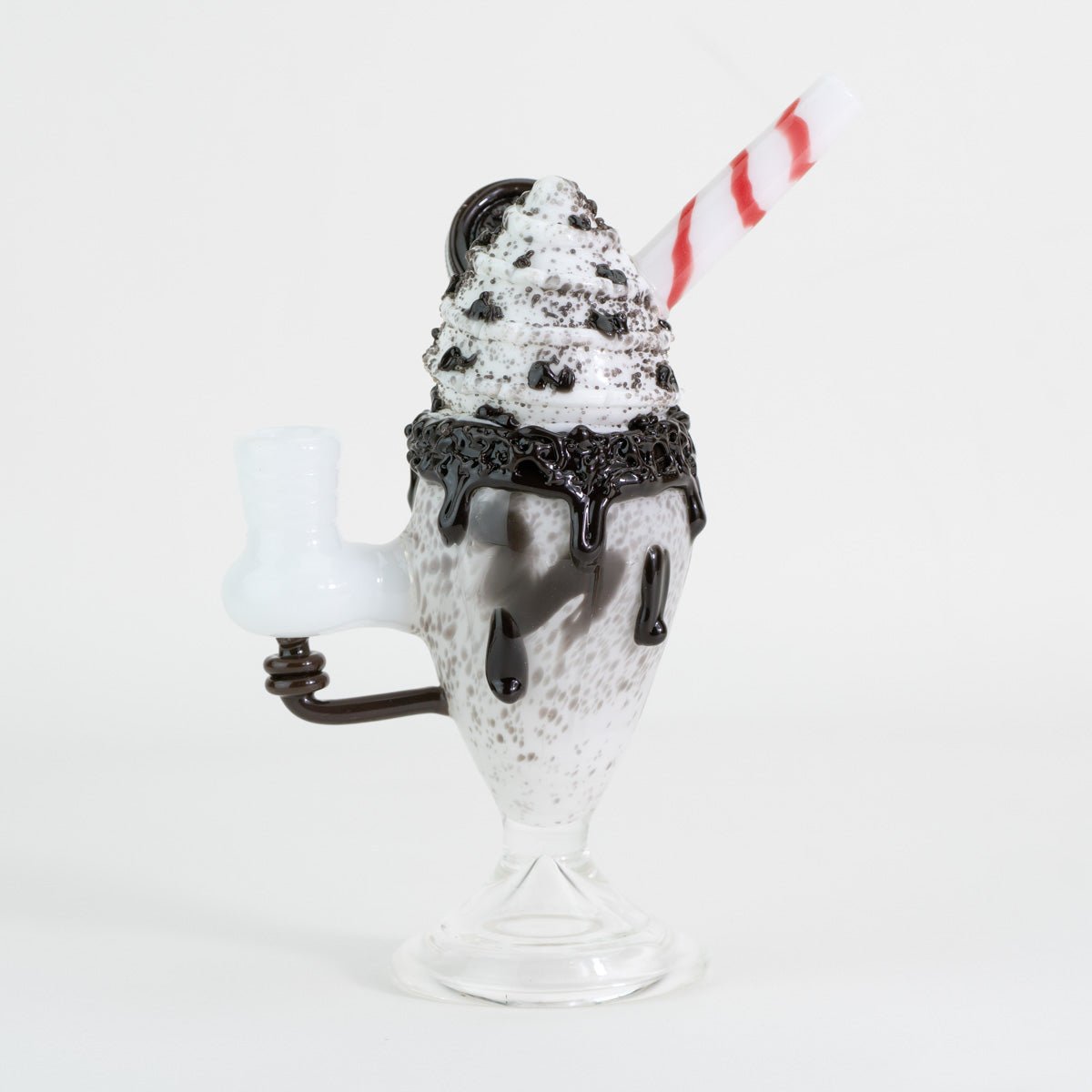 A cookie sundae mini rig turned back on white background
