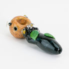 A mini spoon pipe with beehive decorative
