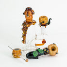 Bee themed flower bundle featuring honey mini rig, beehive bowl piece, beehive spoon pipe, and beehive pokerwand