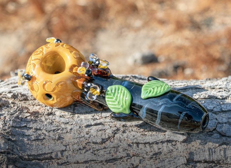 An Empire Glasswork's beehive spoon pipe made entirely of glass for smoking