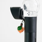 Fruit-themed glass Puffco charm with a sweet peach design on a Pivot device