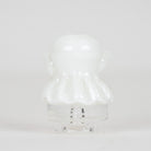 Close-up of the sculpted white ghost and expressive face on the glass mouthpiece