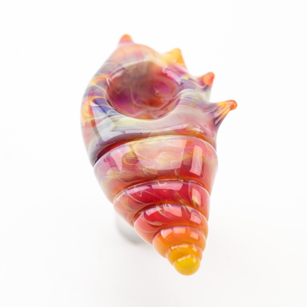 Close-up of the detailed lampwork and marbled colors on the seashell bowl piece from Empire Glassworks