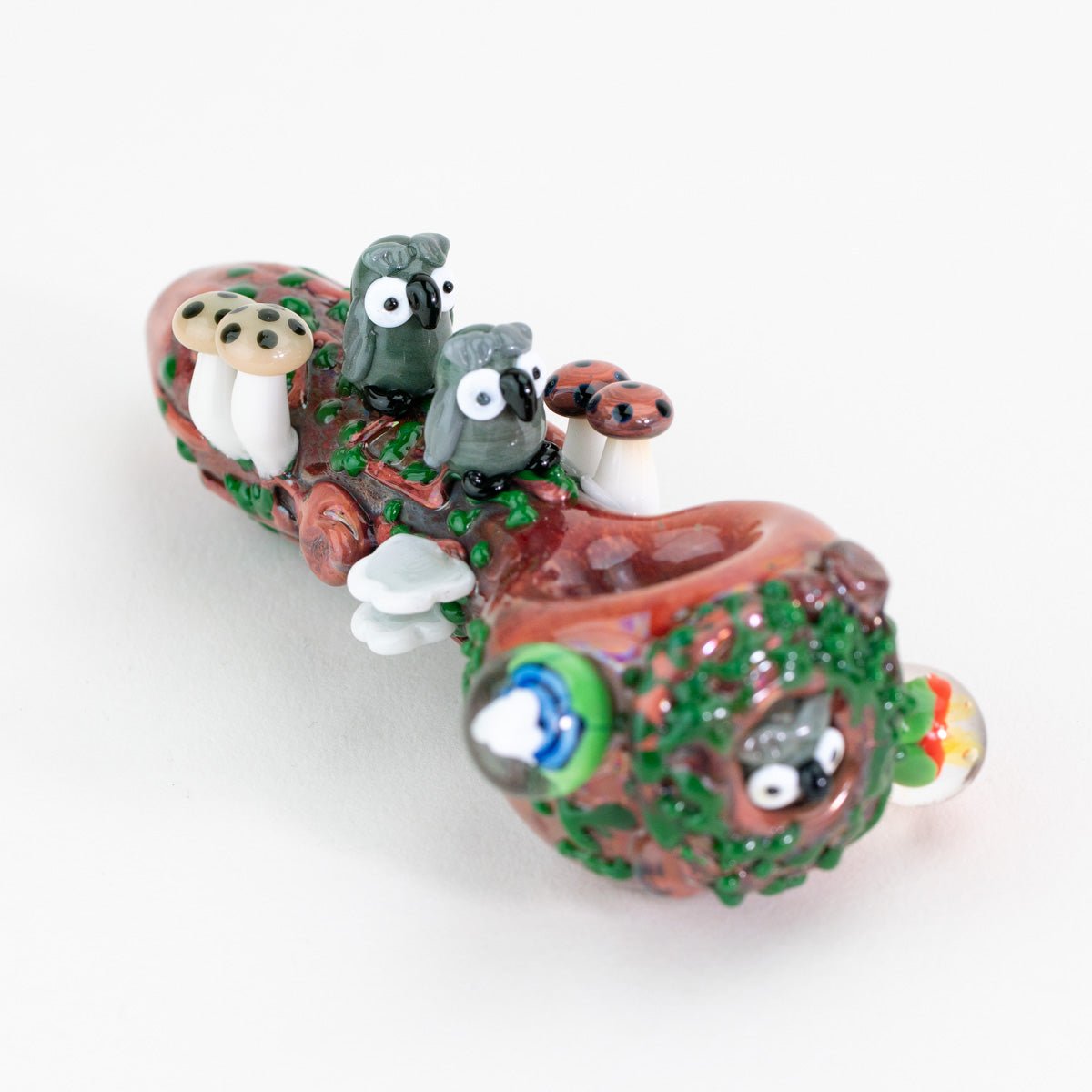 A forest inspired spoon with owls and nature