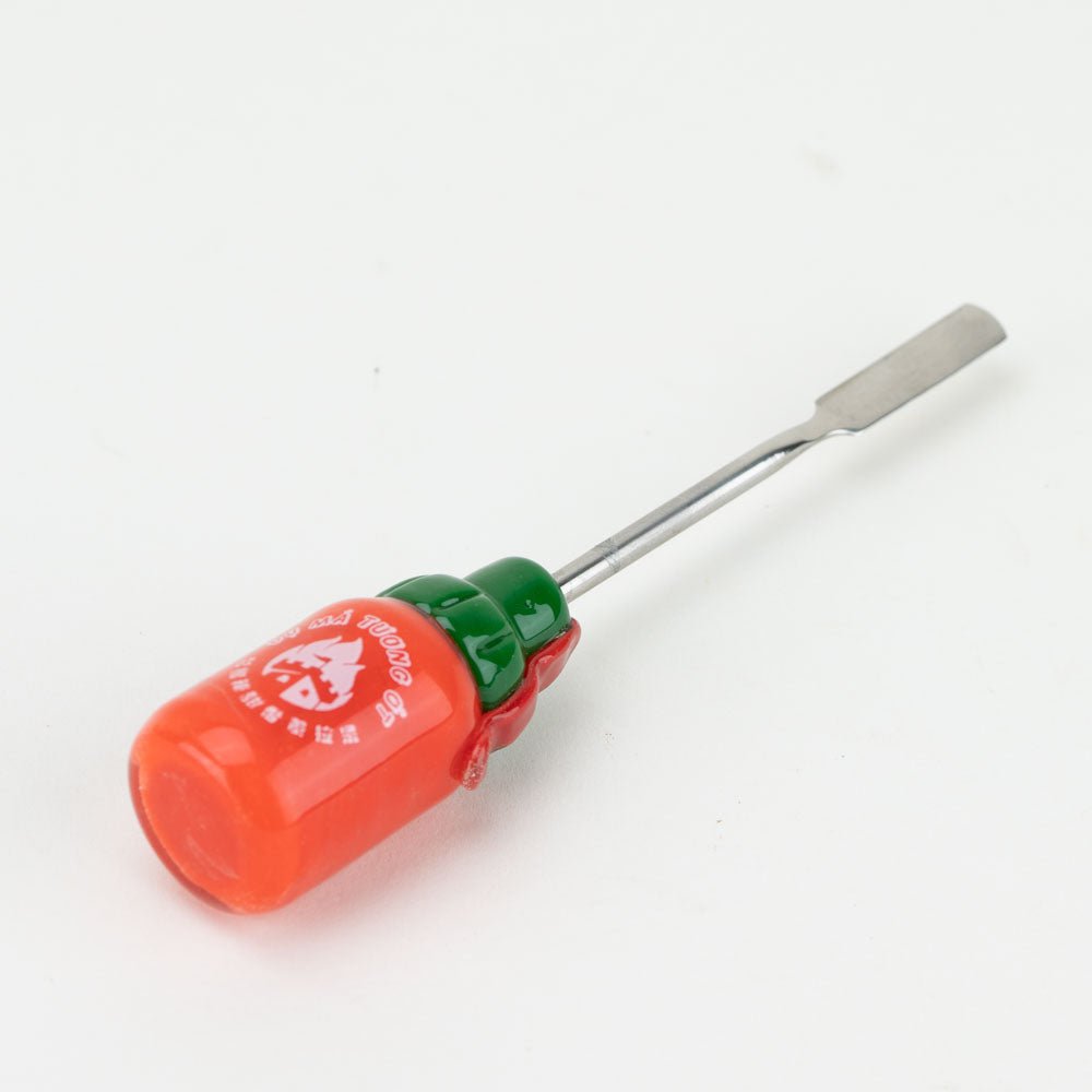 Hot sauce dabber for concentrates with decorative glass handle and metal tip