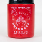 Detailed hot sauce bottle artwork on the Empire Glassworks Proxy Core attachment