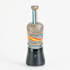 Colorful striped bottle-shaped device on a white background