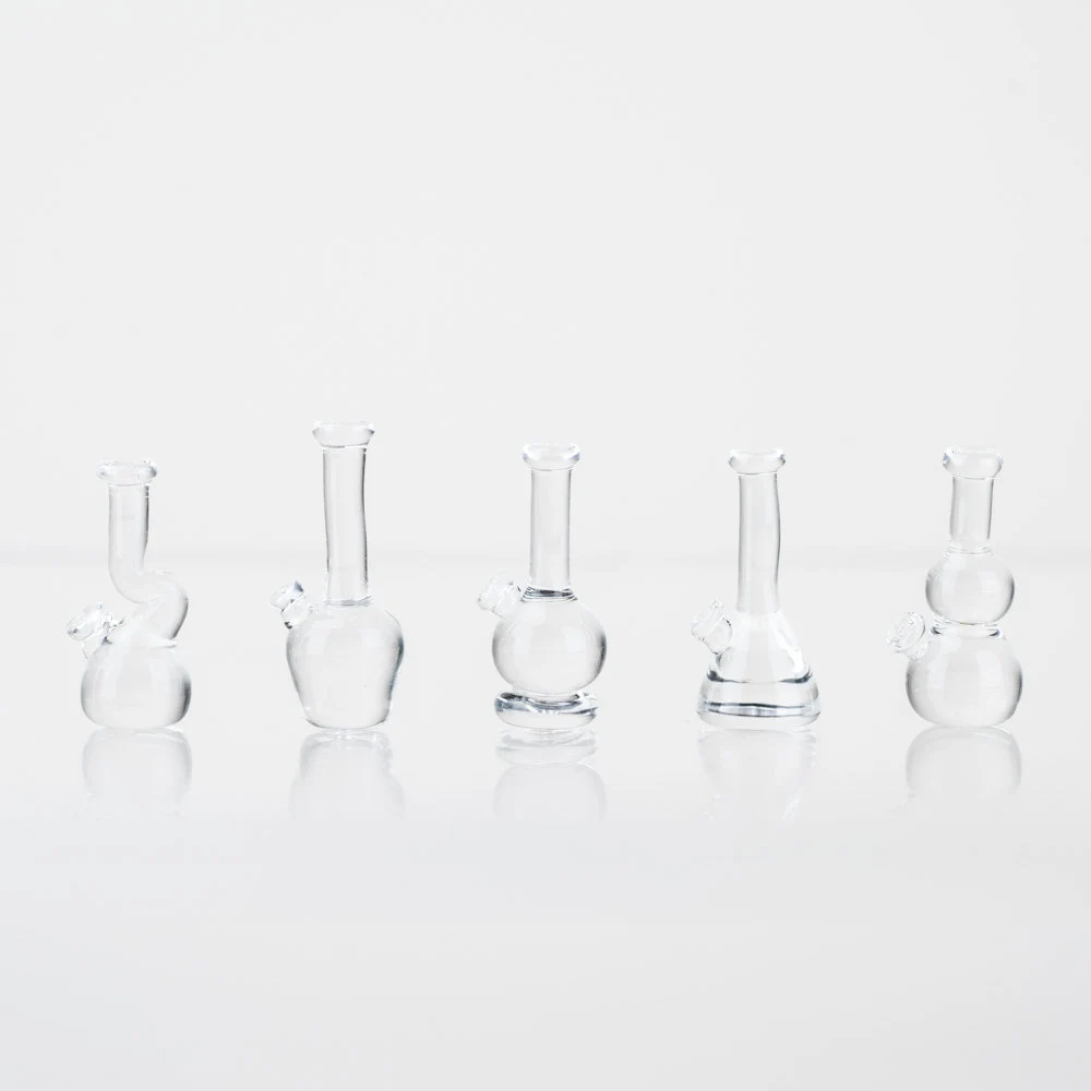 Five piece set of lego bongs in different shapes.