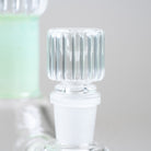 Close-up of the clear ribbed glass bowl and frosted joint included with the Empire Glassworks Julep Signature Beaker